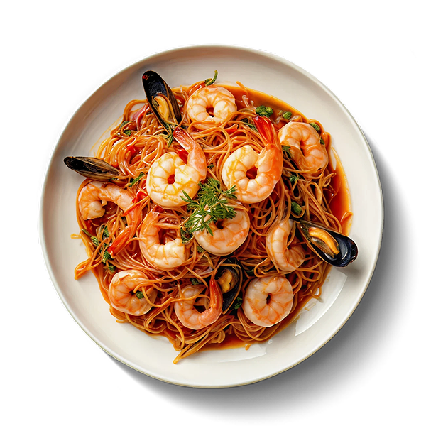 Spaghetti in tomato sauce with prawns, mussels and fresh herbs.