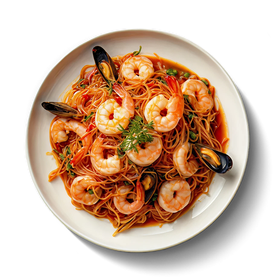 Spaghetti in tomato sauce with prawns, mussels and fresh herbs.